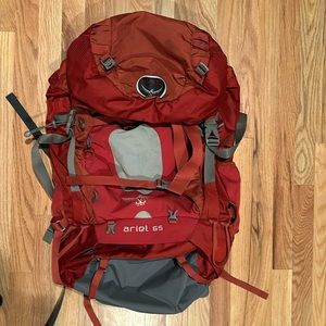 Osprey Women’s Ariel 65 Backpack. Deep burnt orange color.